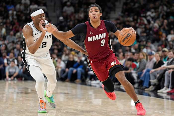 Miami Heat guard Dru Smith (9) drives to the basket past San Antonio Spurs guard Malaki Branham (22) during the second half at Frost Bank Center.